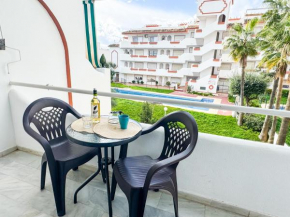 One bed apt, terrace, sea and pool view, walk to beach